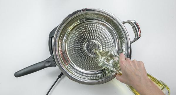 Colocar la sartén con el aceite en el Navigenio a temperatura máxima (nivel 6). Encender el Avisador (Audiotherm), colocarlo en el pomo (Visiotherm) y girar hasta que se muestre el símbolo de “chuleta”.