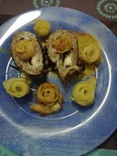 Redondo de carne  con guarnición de flores de patata